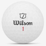 Wilson Staff zip golf ball close-up showing logo and dimple pattern