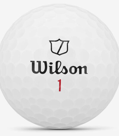 Wilson Staff zip golf ball close-up showing logo and dimple pattern
