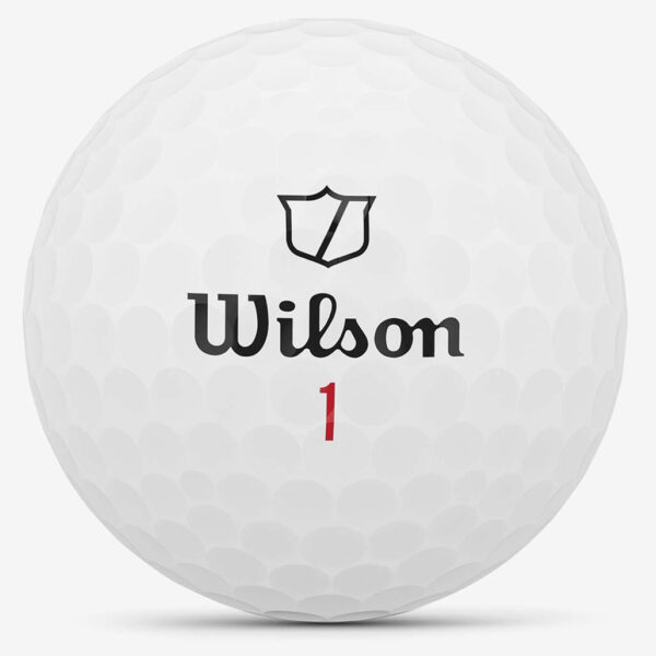 Wilson Staff zip golf ball close-up showing logo and dimple pattern